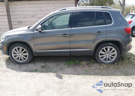 2014 Volkswagen Tiguan Sel z USA, uszkodzony, nr VIN WVGAV3AXXEW059222